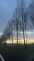 Morning commute captures wind turbines at sunrise near Deil