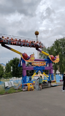 Amusement park activities documented in Brest, Belarus during afternoon hours