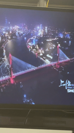 Shanghai commuters share bench, phones at subway station