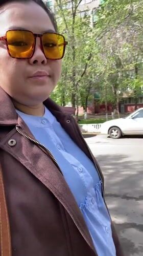 Person films themselves in Orenburg park at dawn