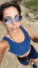 Woman films resort walk in Kuta Selatan, Indonesia
