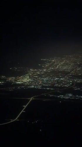 Night flight departure captured from Muharraq airport terminal