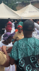 Community celebration with music and money distribution in Eziudo, Nigeria