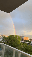 Double rainbow appears over Plovdiv, Bulgaria cityscape