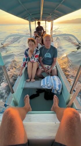 Group travels by narrow boat in Banjar, Indonesia