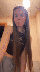 Woman poses for photo in sleeveless top in Russia