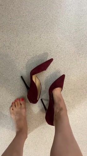 Trying on heels in London: red suede and black strappy styles