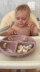 Toddler enjoys dumpling meal in Russian town