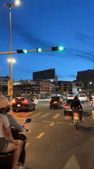 Đà Nẵng at dusk, streets and bridges in the blue hour