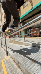 Skateboarder performs tricks on rails and ramps in Terrassa