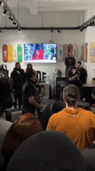 Band performs to small crowd in skateboard-decorated São Paulo venue