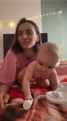 Mother and baby recorded playing indoors in Moscow home