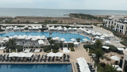 Aerial view of a busy resort complex along Azerbaijan's coast.