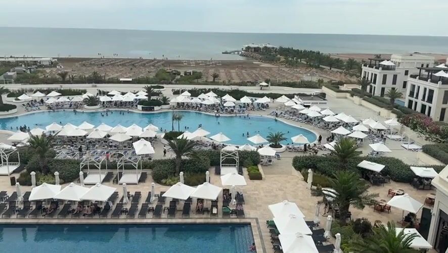 Aerial view of a busy resort complex along Azerbaijan's coast.