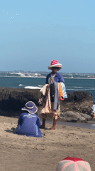 Morning beach activity captured in North Kuta, Indonesia