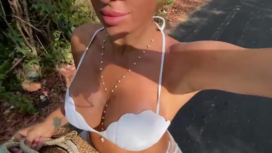 Woman Takes Tropical Selfies in Kuta Selatan Beach Area