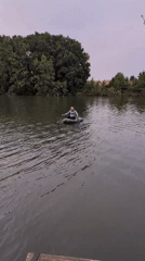 Dusk paddle on a quiet Ukrainian river at golden hour