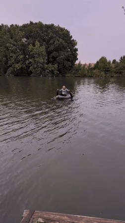 Dusk paddle on a quiet Ukrainian river at golden hour