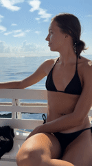 Woman enjoys boat trip off General Luna coast