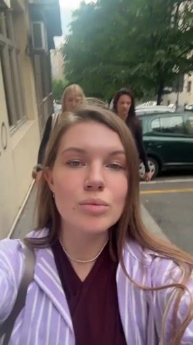 Three women film themselves walking through Belgrade streets