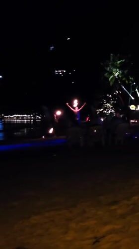 Fire dancers perform evening beach show in Ko Tao