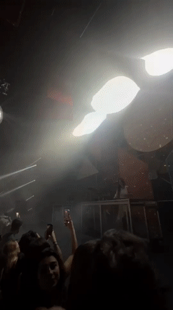 Live DJ and drum set performance at a Mexico City nightclub