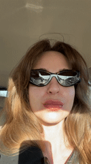 Woman in sunglasses observed in vehicle in Vnukovo
