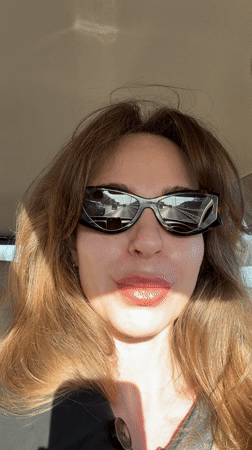 Woman in sunglasses observed in vehicle in Vnukovo