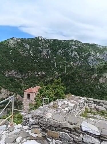 Tourist documents historic Bulgarian fortress and medieval church sites
