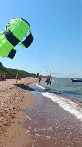 Lazy summer afternoon at Kuchugury beach, Sea of Azov