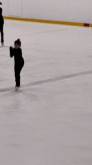 Figure skater practices on ice rink in Vidnoye, Russia