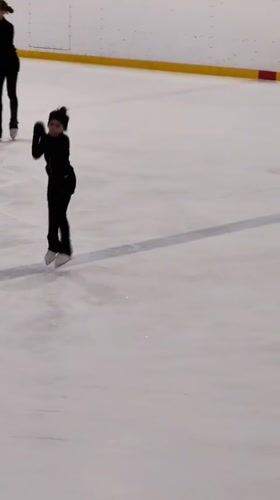 Figure skater practices on ice rink in Vidnoye, Russia