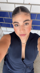Woman Takes Selfies in Mexican Town Square