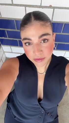 Woman Takes Selfies in Mexican Town Square