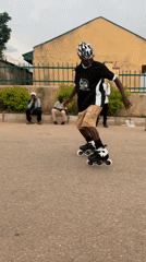 Inline skaters practice obstacle course training on Jos street