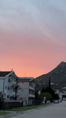 Evening life captured in Sutomore residential streets during sunset