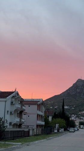 Evening life captured in Sutomore residential streets during sunset