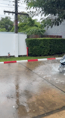 Flooded streets and rainy-day scenes across Chalong