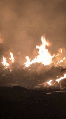 Trash fire burns on street in Bac Nha Trang Ward