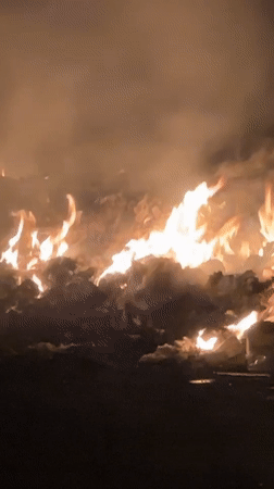 Trash fire burns on street in Bac Nha Trang Ward