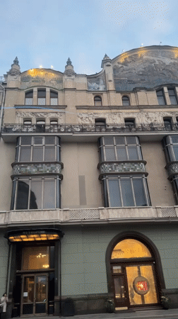 Moscow street views and Bolshoi Theatre captured from moving car