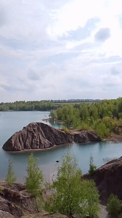 Turquoise water landscape documented in Pisarevo, Russia