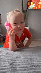Children play with toy phone, tend to baby in Russian home