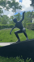 Moscow morning scenes capture sculptures, river views, bridge infrastructure