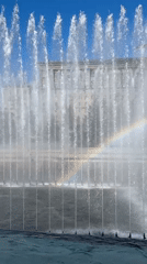 Saint Petersburg fountain catches a rainbow on a sunny morning