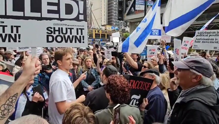 Protesters gather in New York with Zionism-related signs