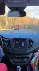 Fire truck passes through intersection in Niva, Russia