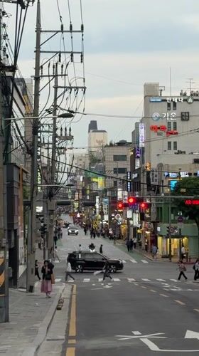 Morning street life documented across Seoul neighborhoods