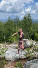 Whip practice on a rocky overlook above Gubakha's birch forests