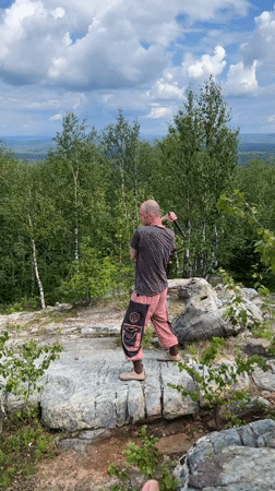 Whip practice on a rocky overlook above Gubakha's birch forests